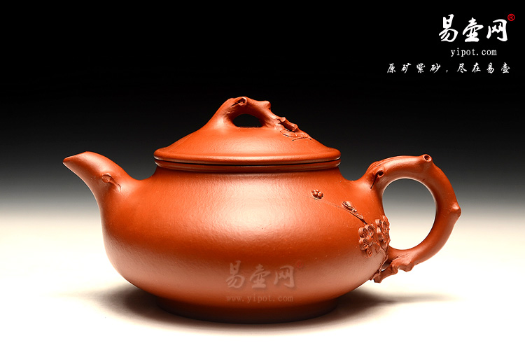 宜兴紫砂壶工艺师:周荣华铁骨寒梅壶图片
